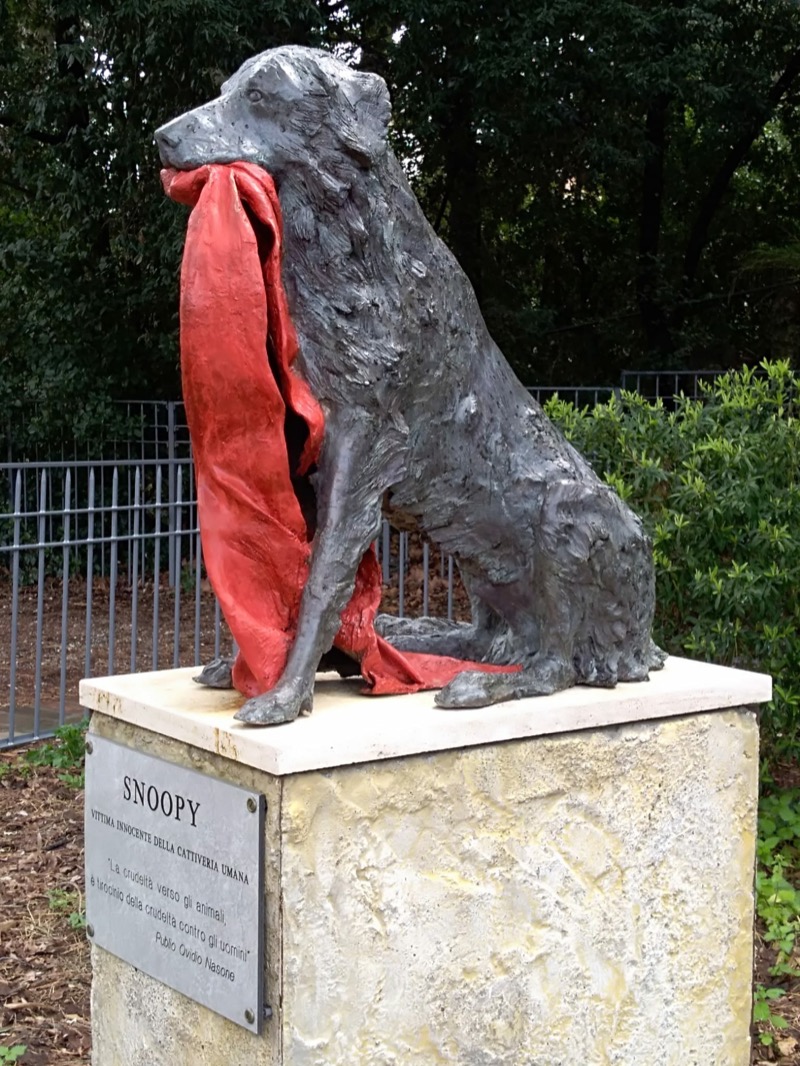 A Snoopy statue standing in the Villa Fabbricotti park in Livorno, Italy